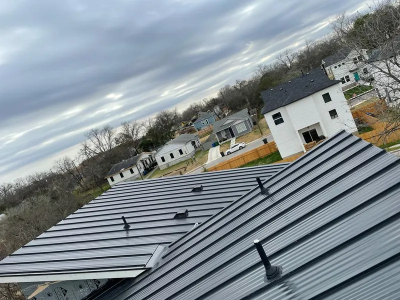 Standing seam metal roof panels with vents for Skylight Repair in Silsbee